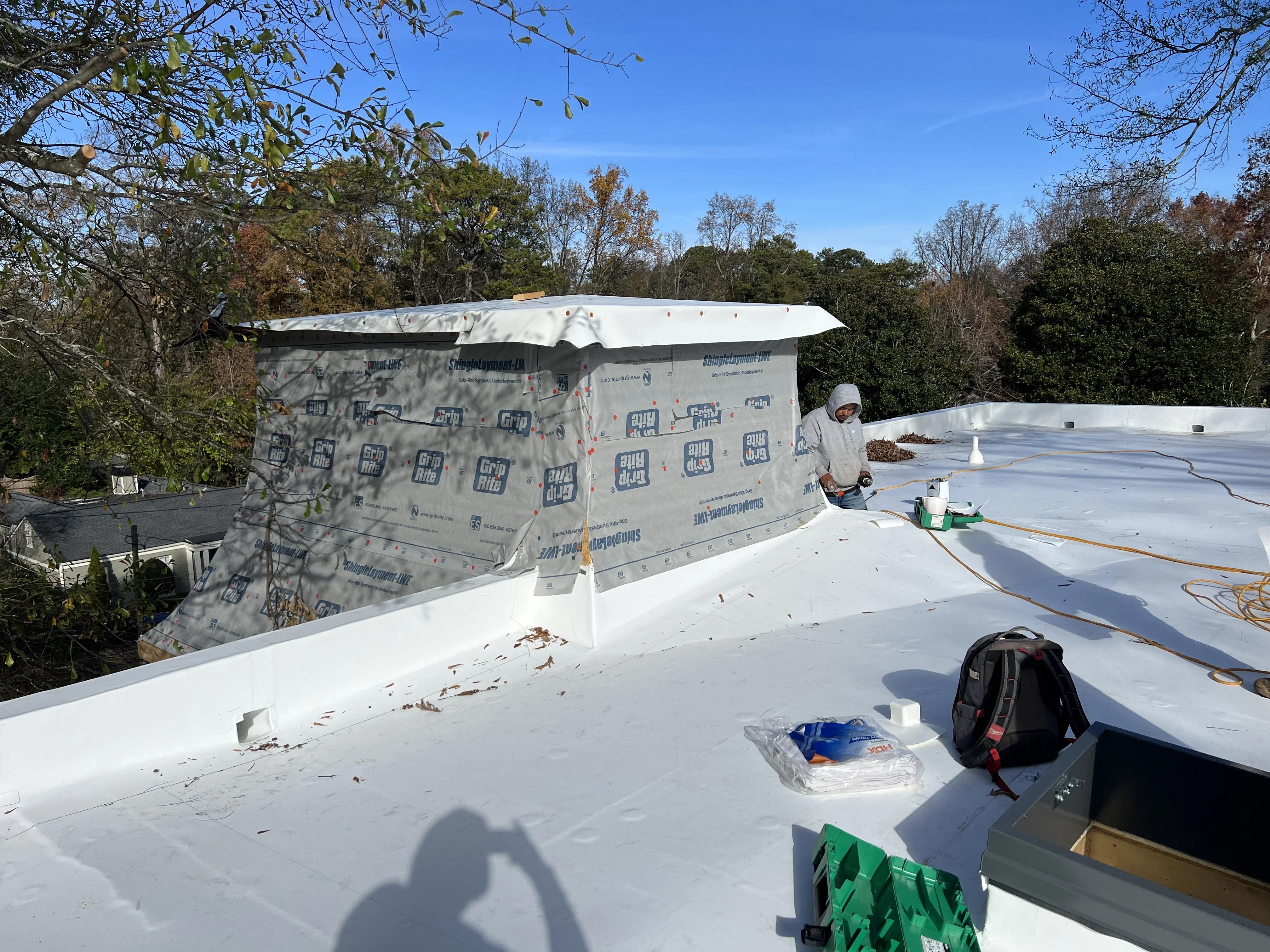 TPO low-slope roofing installation and waterproofing preparation