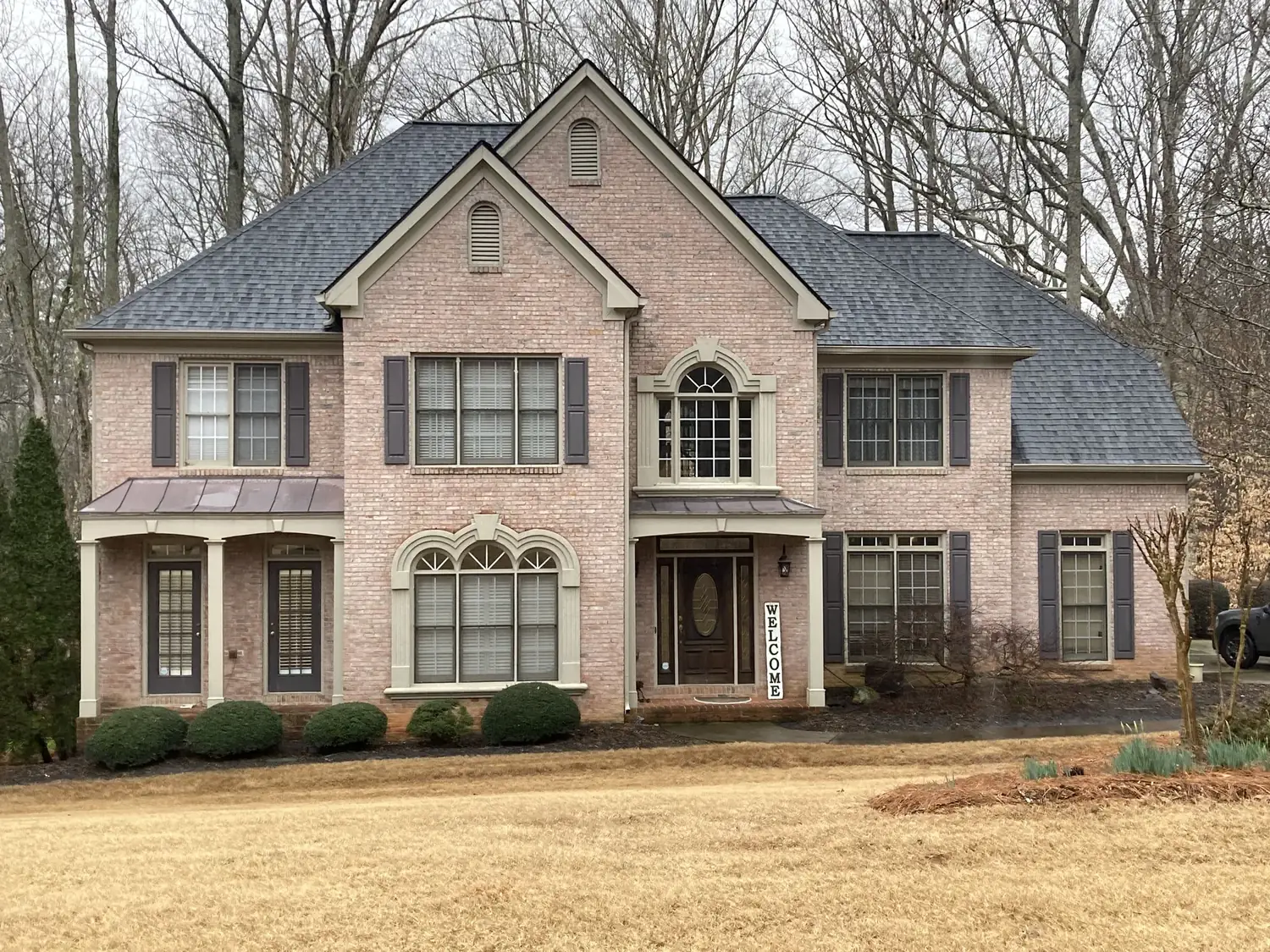 large home roofing project