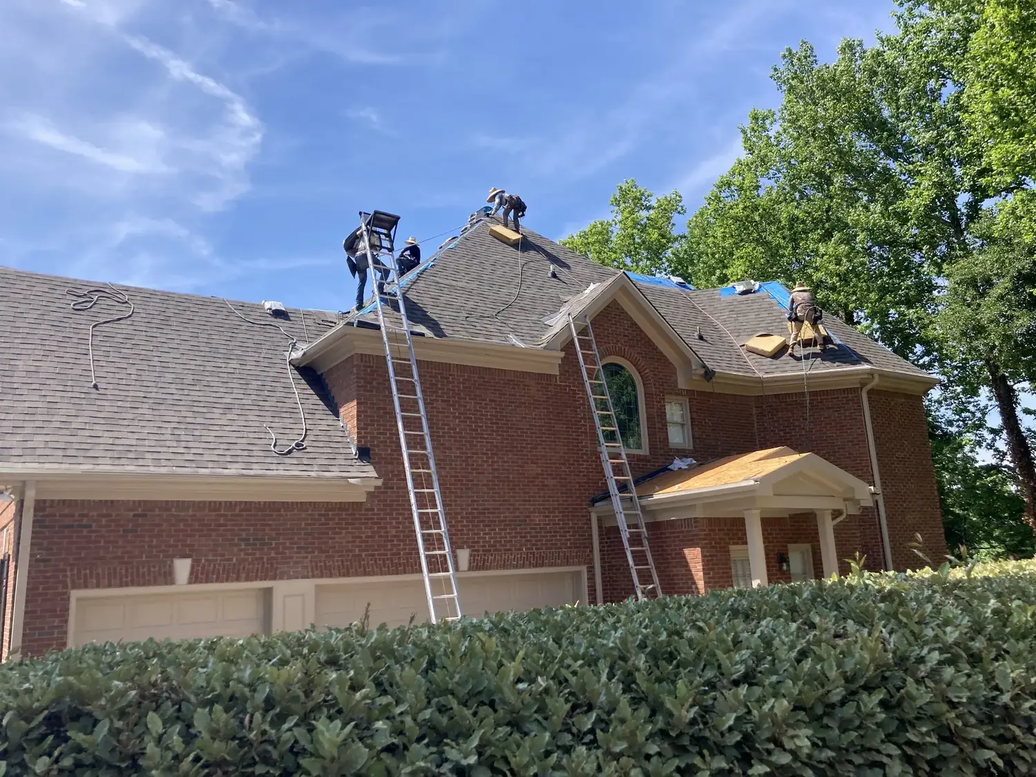 Installation, roofers visible roofing project