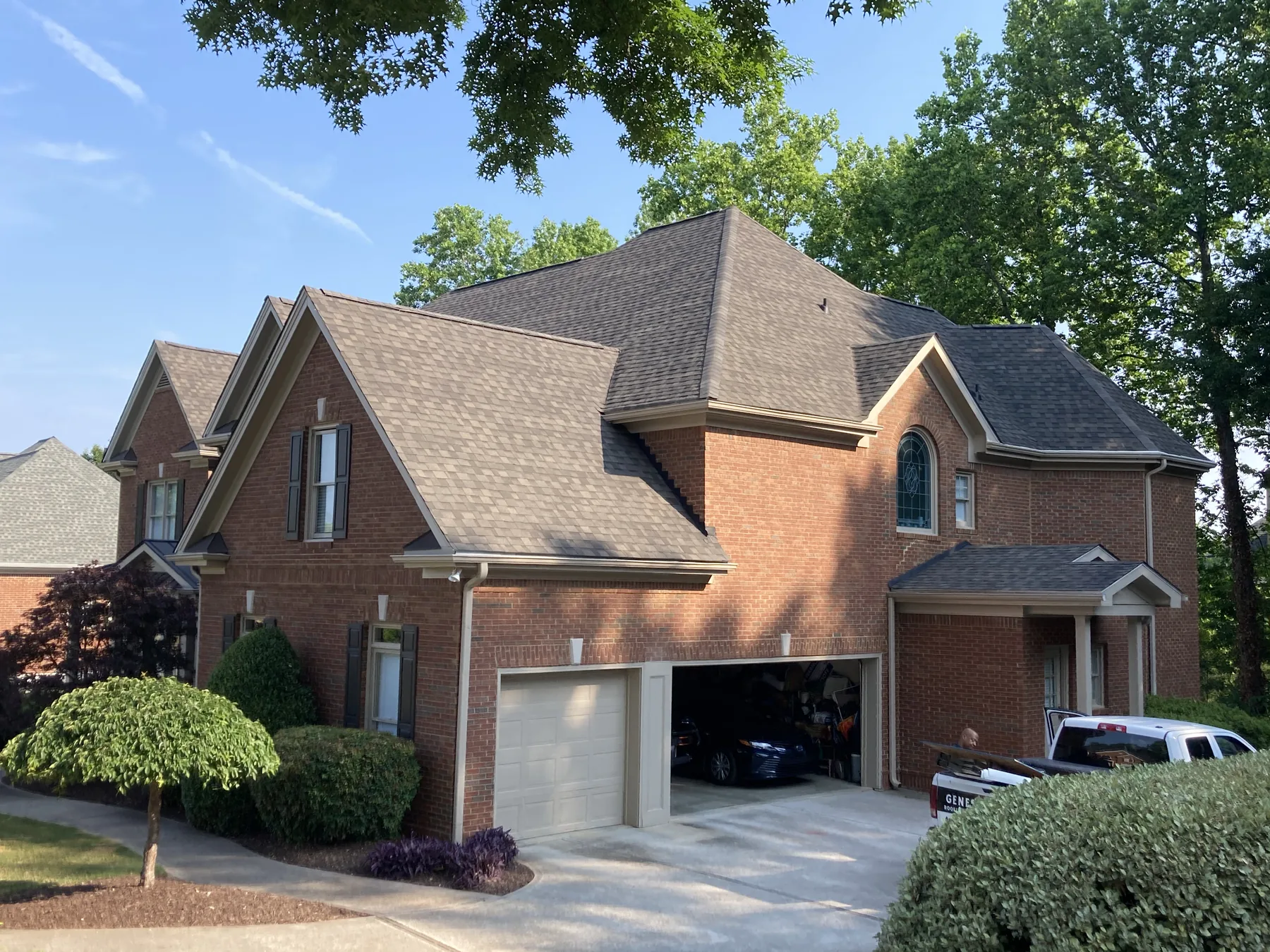 Another angle of the completed brick home roof