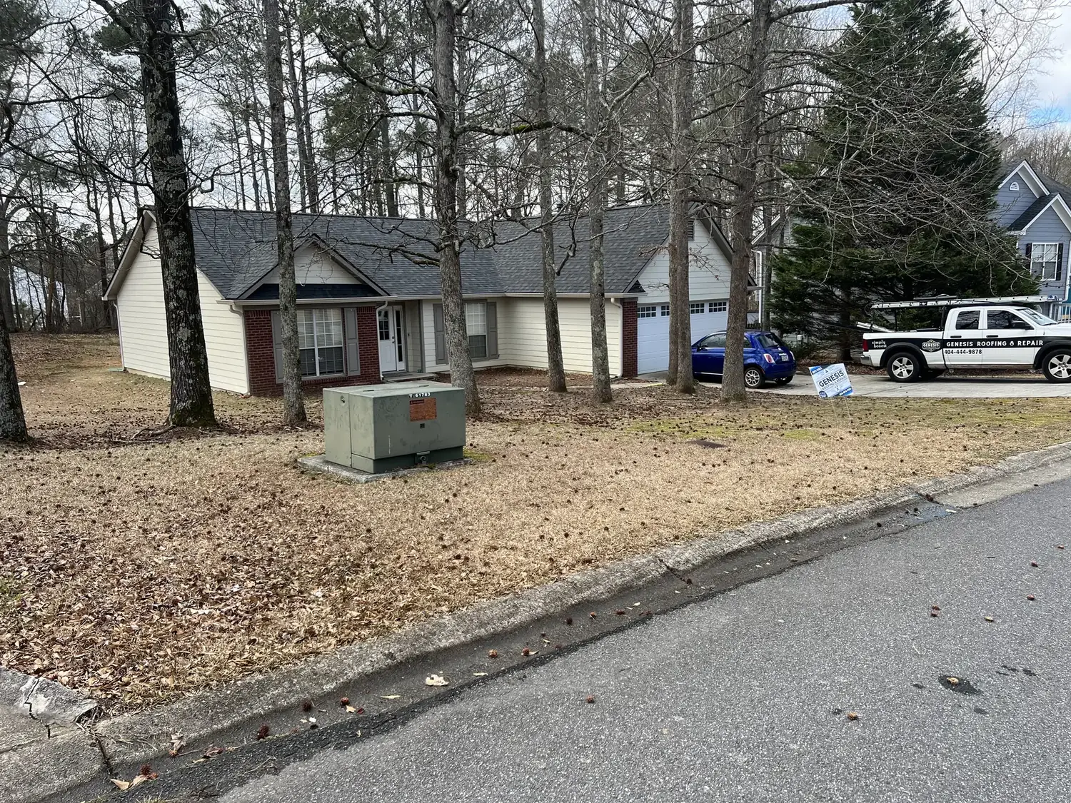 Wide house view roofing project