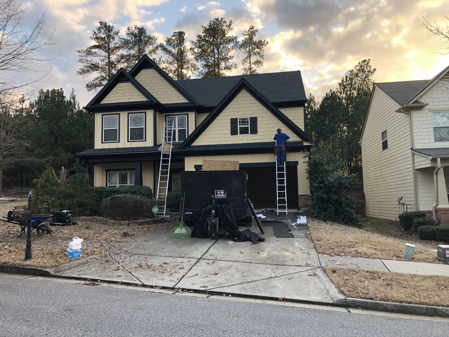 Roofing crew working on a Lawrenceville home
