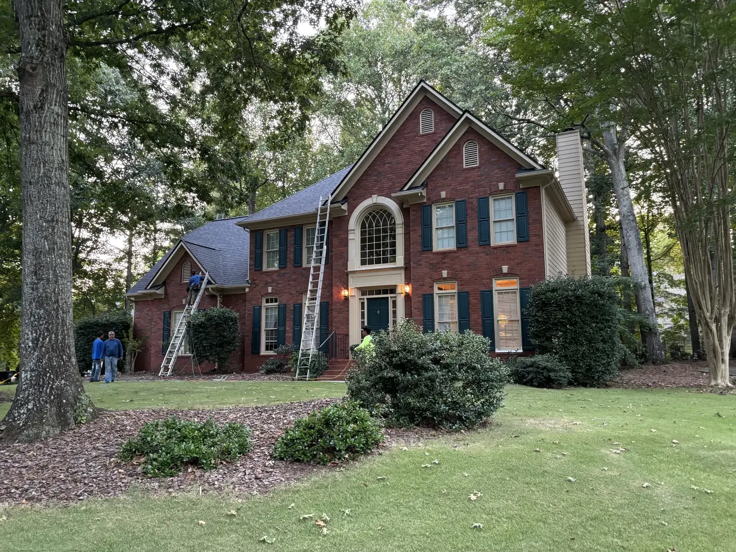 Shaded home, completed roofing project