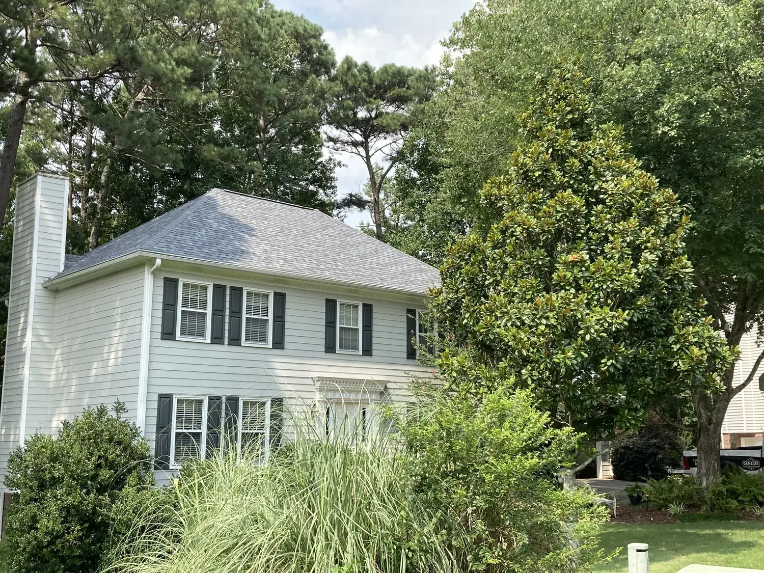 completed house roofing project
