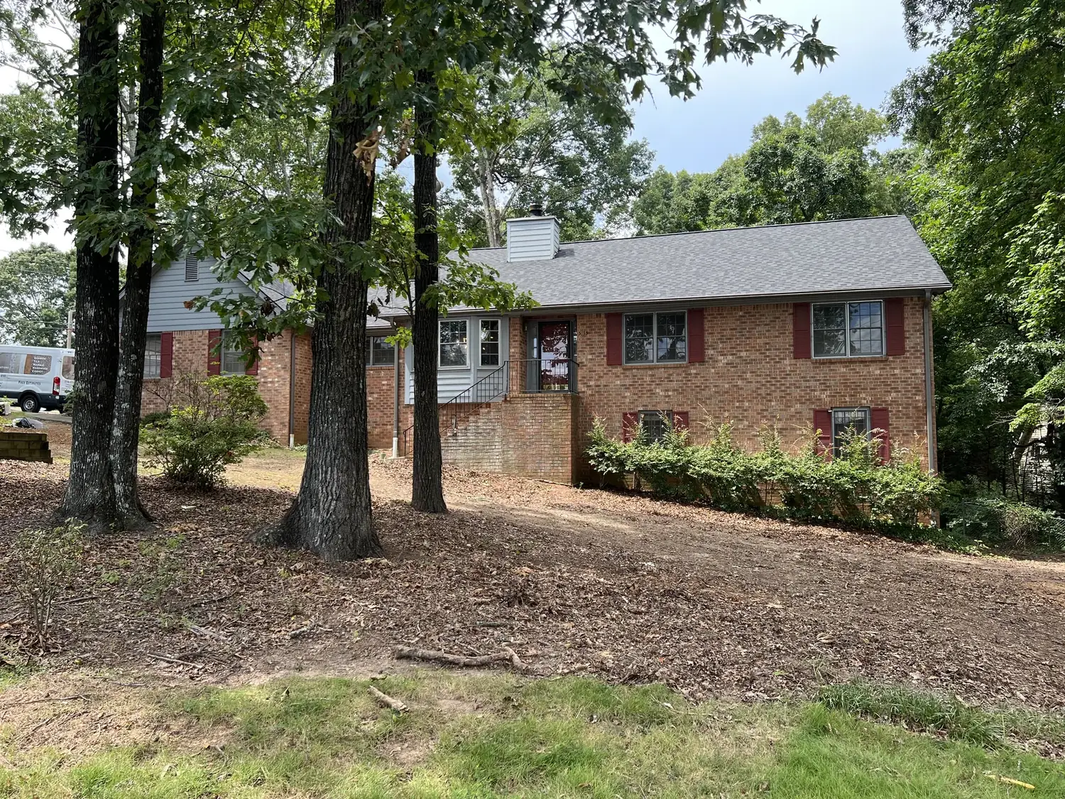 Brick home, roof visible roofing project